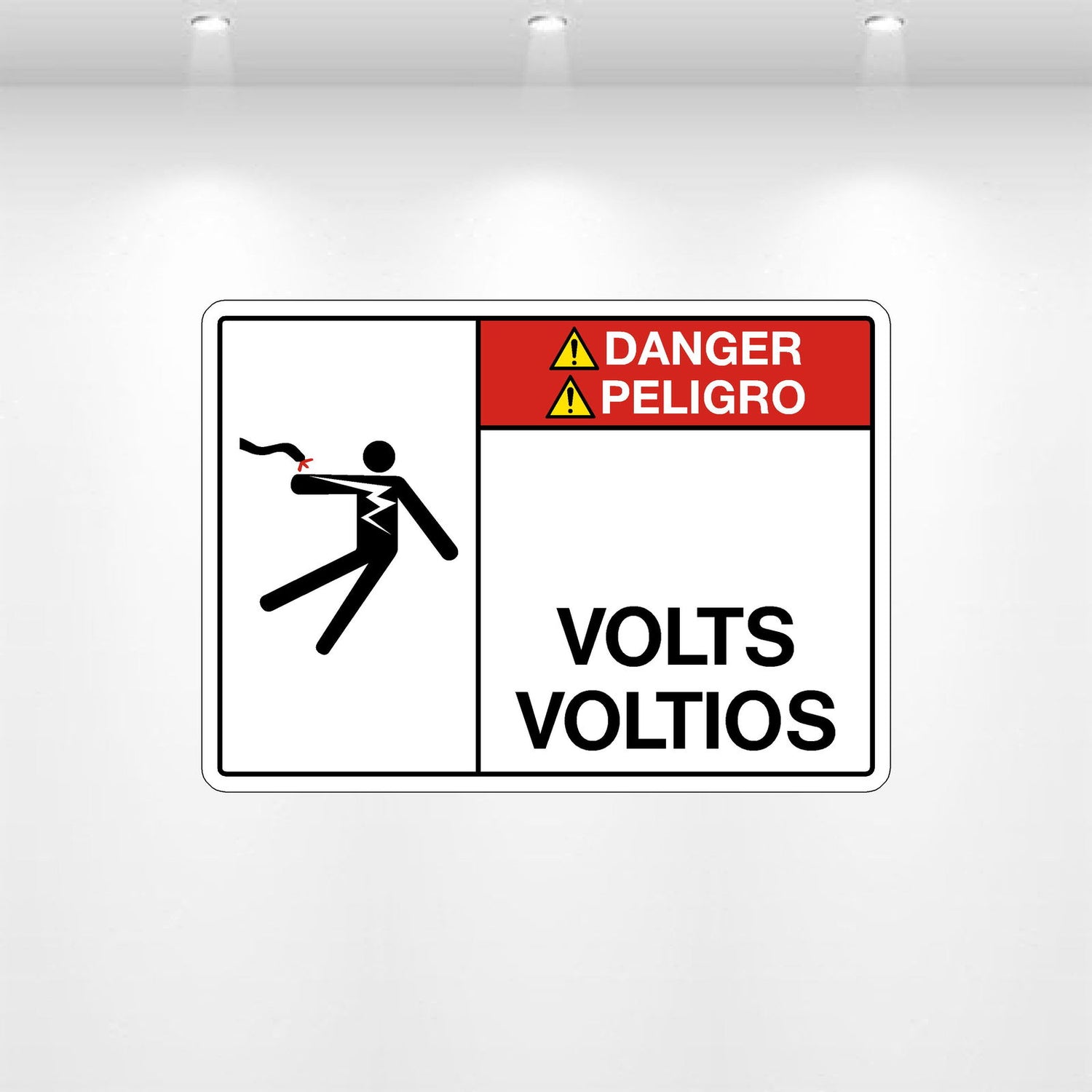 Bilingual 'Volts Blank' safety decal in English and Spanish for electrical equipment