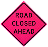 Road Closed Ahead roll-up traffic sign with ORALITE® Super Bright reflective material, mounted on a foldable stand for quick deployment in roadside work zones.