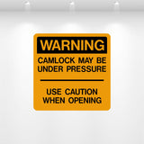 Camlock May Be Under Pressure warning safety decal for industrial equipment