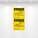 Tall Caution Keep Off and Load Evenly safety decal on industrial equipment