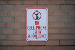 12x18 inch 'No Cell Phone Use' sign with high-visibility prismatic material